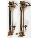 A matched pair of lacquered brass lime illuments for a biunial magic lantern:, unsigned,