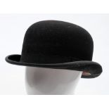 A black felt bowler hat by Lincoln Bennett & Co, London,: in original hat box.