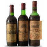 A bottle of Chateau Grand- Puylacoste Saint Guirons Pauillac 1972,