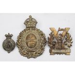 A Tyneside Scottish Regiment cap badge:,