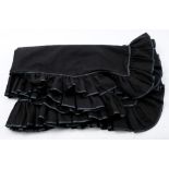 A mid 20th century French handmade black woollen shawl:, with frilled edge and black lace trim..