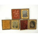 A group of three cased ambrotypes of a woman and two children, late 19th century:,