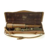 A late 19th/early 20th century 'Davon Patent' 2 inch micro-telescope in leather case:,