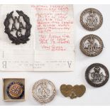 A WWII Woman's Army Auxiliary Corps cap badge: together with four GRV wound badges,