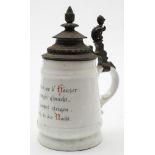 A late 19th century German porcelain Bierstein with lithophane base: the spelter lidded top above