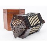 An early 20th century rosewood cased thirty-three key concertina by Lachenal & Co London:,