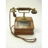 A Sterling Telephone & Electric Company brass and walnut desk intercom telephone:, with five lines,