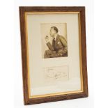 A framed autograph of Sir Noel Coward (1899-1973): mounted together with a facsimile,