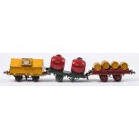 Hornby O gauge, a group of six goods wagons:, 'McAlpine & Sons' rotary tipping wagon and one other,
