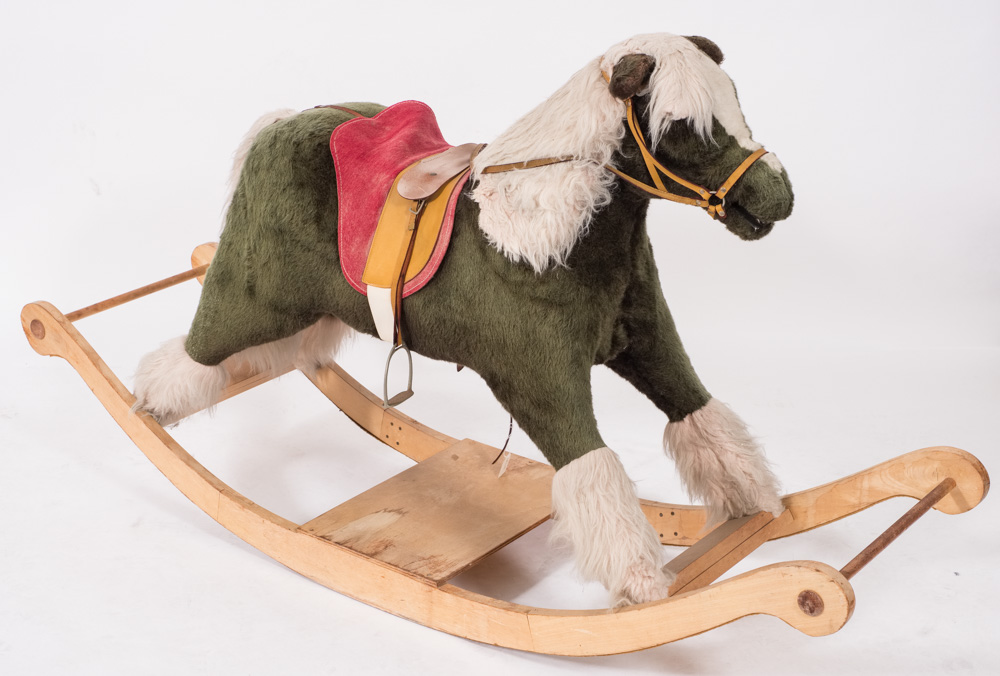 A 20th century green and white plush rocking horse:, unsigned,