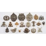 A collection of various cap badges:, including Argyle & Sutherland,