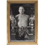 Henry Cooper (1934-2011) a signed black and white photograph:,