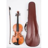 An early 20th century German student violin:, scroll carved headstock,
