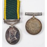 A George V Volunteer Long Service Medal '2252 L Serjt H J Taylor 22/Middx VRC':,