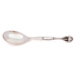 A Georg Jensen silver Acorn pattern serving spoon, assay master Christian Heise,