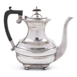 A George V silver coffee pot, maker Walker & Hall, Sheffield, 1932: of barge -shaped outline,