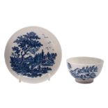 A First Period Worcester blue and white teabowl and saucer: transfer printed in 'The European