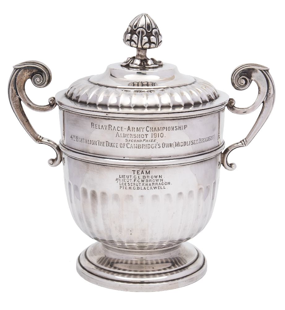 An Edward VII silver presentation twin handled cup and cover, maker Martin Hall & Co, Sheffield,