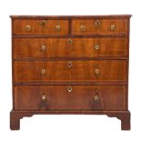 An 18th Century walnut veneer, crossbanded and inlaid rectangular chest:, with beechwood sides,