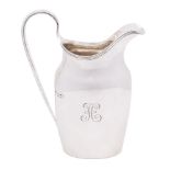 An early 20th century silver cream jug, maker George Nathan & Ridley Hayes, Chester,