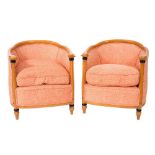 A pair of beechwood tub-shaped armchairs in the Biedermeier style:,
