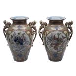 A pair of large Alexandra Lauder [Barnstaple] pottery vases: with grotesque serpent handles,