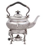 An Edward VII silver tea kettle, stand and burner, maker Henry Atkin, Sheffield, 1901: monogrammed,