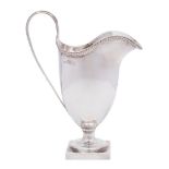 An Edward VII Britannia silver cream jug, maker Maurice Freeman, London,