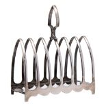 An Edward VII silver six division toast rack, maker Walker and Hall, Sheffield,