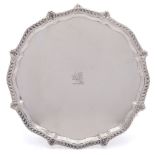 A George V silver salver, maker Henry Wigfull, Sheffield, 1910: crested,