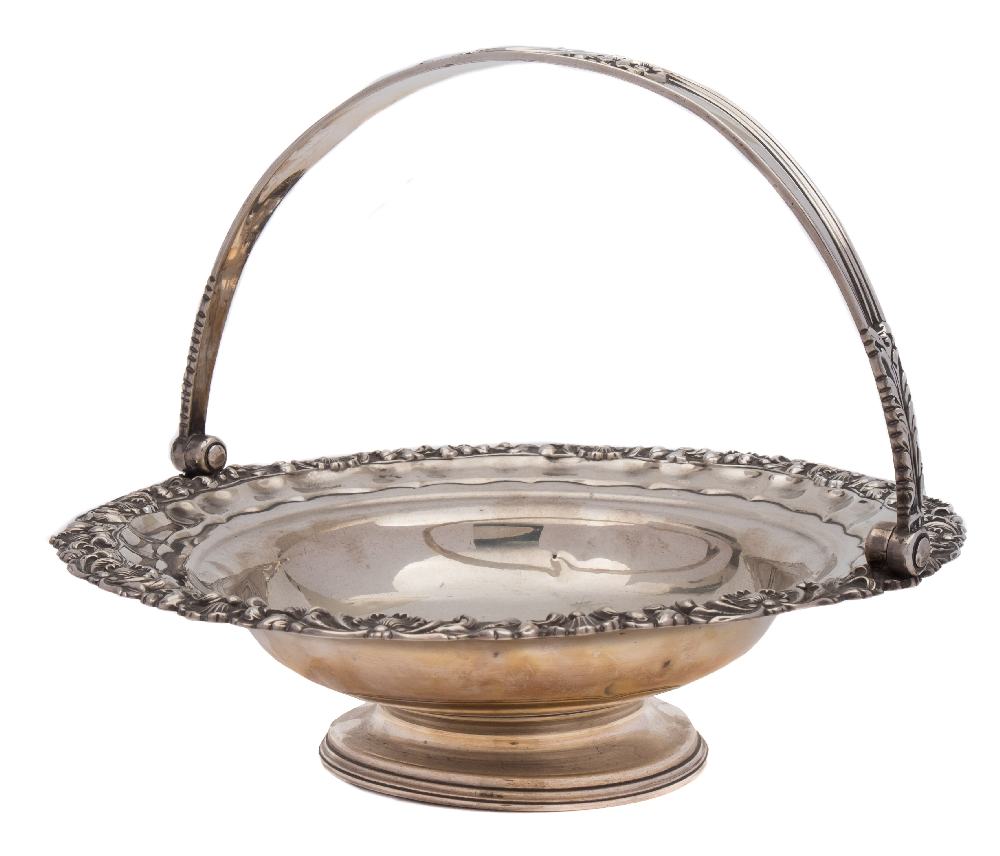 A George IV silver swing-handled cake basket, maker John & Thomas Settle, Sheffield,