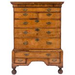 An early 18th Century walnut and feather banded chest on stand:,