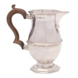 A George V silver cream jug, maker's mark worn, Birmingham, 1911: of octagonal baluster form,