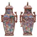 A pair of Chinese Mandarin pattern vases and covers: of flattened baluster form with chilong