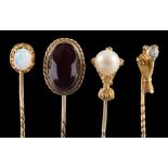 A button pearl mounted stick-pin and three others: the pearl (untested) approximately 8mm diameter,