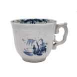 A First Period Worcester blue and white coffee cup: of moulded strap-fluted form with scroll handle,