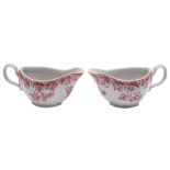 A pair of Chinese export 'camaieu rose' sauce boats: painted with floral sprays and foliage,