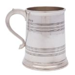 A George VI silver mug, maker's mark worn, London, 1942: of plain cylindrical form,