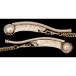 Two early 20th century silver plated boson's whistles on chain,