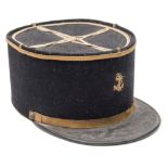 A French Naval kepi:, with gilt braid and foul anchor to body, black leather peak.