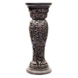 A turned wood jardiniere stand with shipworm (Teredo navalis) damage:, of baluster form, 78cm high,