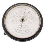 A late 19th /early 20th century Spanish bulkhead barometer by Estrella del Norte:,
