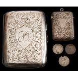 An Edwardian silver vesta case, Birmingham 1900 (0.6oz) and a George V silver cigarette case (1.