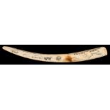 Joe Austin Kakarook (XIX-XX) A late 19th/early 20th century Inuit carved walrus tusk:,