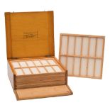 A mid 20th century pine microscope slide box of twelve trays:,