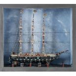 A 19th century cased ship model 'Falcon':, standing rigged over deck with davits and lifeboats,