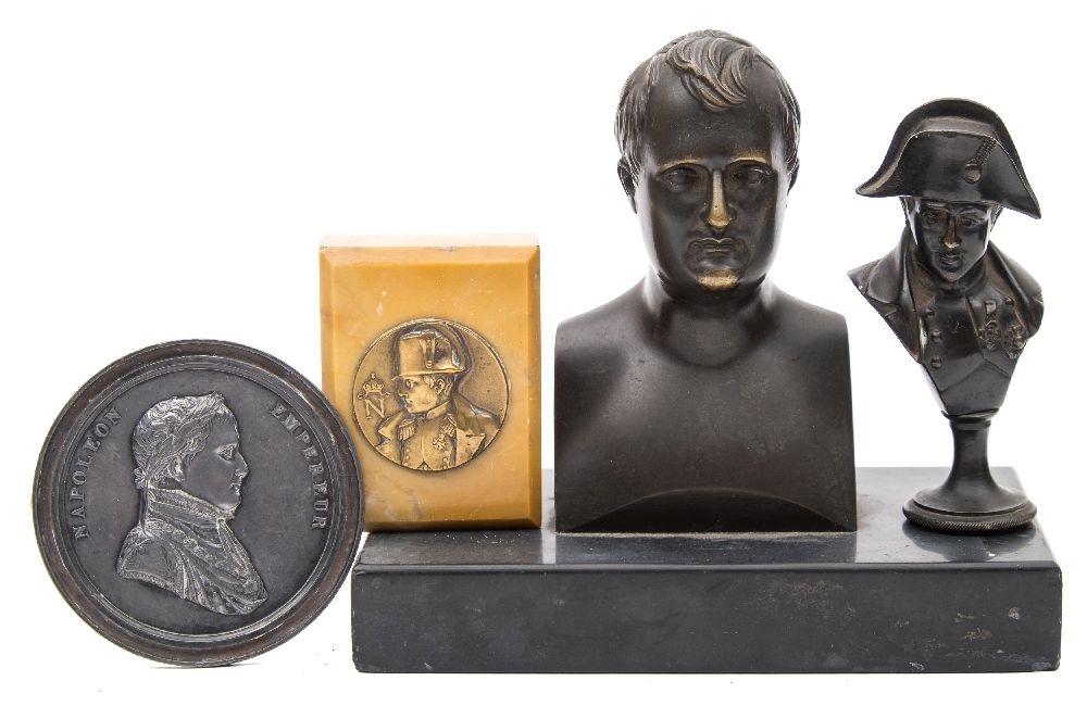 A 19th century bronze bust of Napoleon after Rodin: on a black slate base, 13cm high,