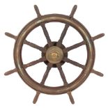 A teak and brass ship's wheel:,
