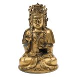 A gilt bronze Bodhisattva: seated cross-legged, his hands formed in vitarka mudra,