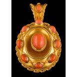 A Victorian gold and coral oval mourning pendant: inset with a central oval cabochon coral